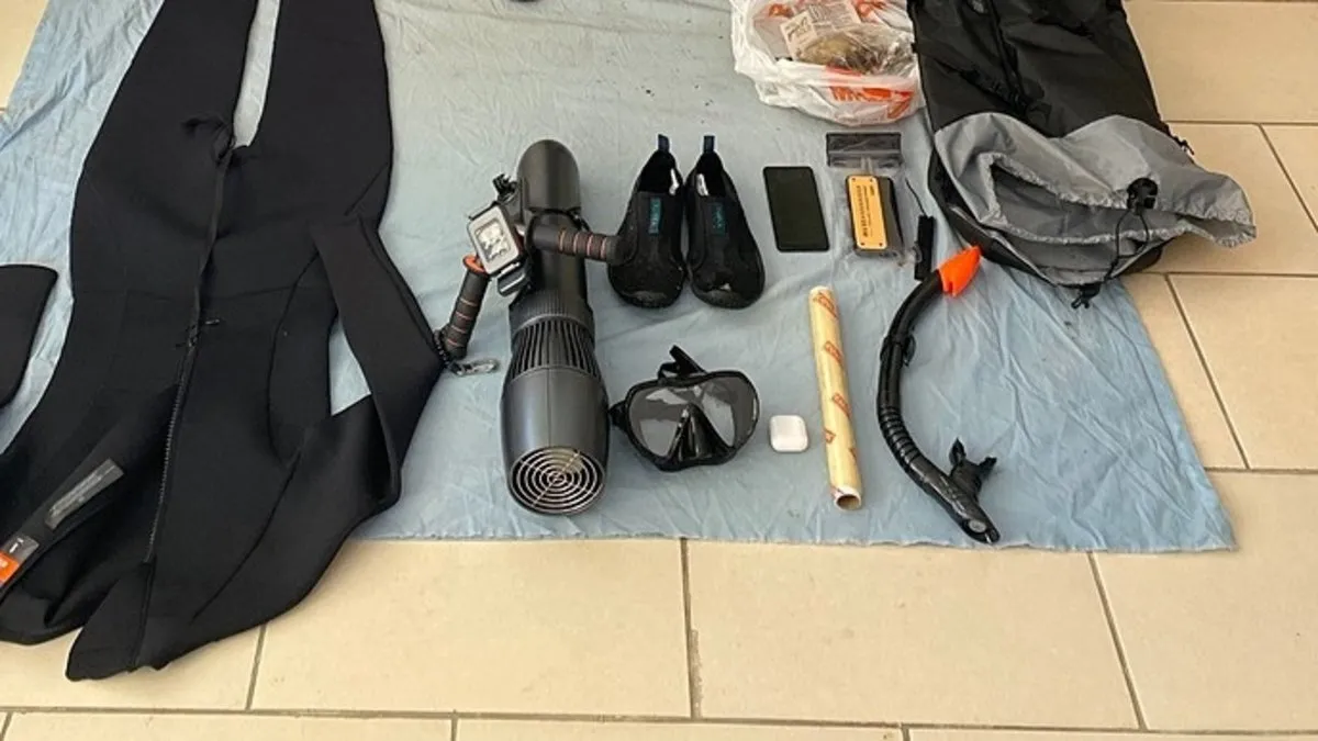 Sualtı scooter ile yakalandı